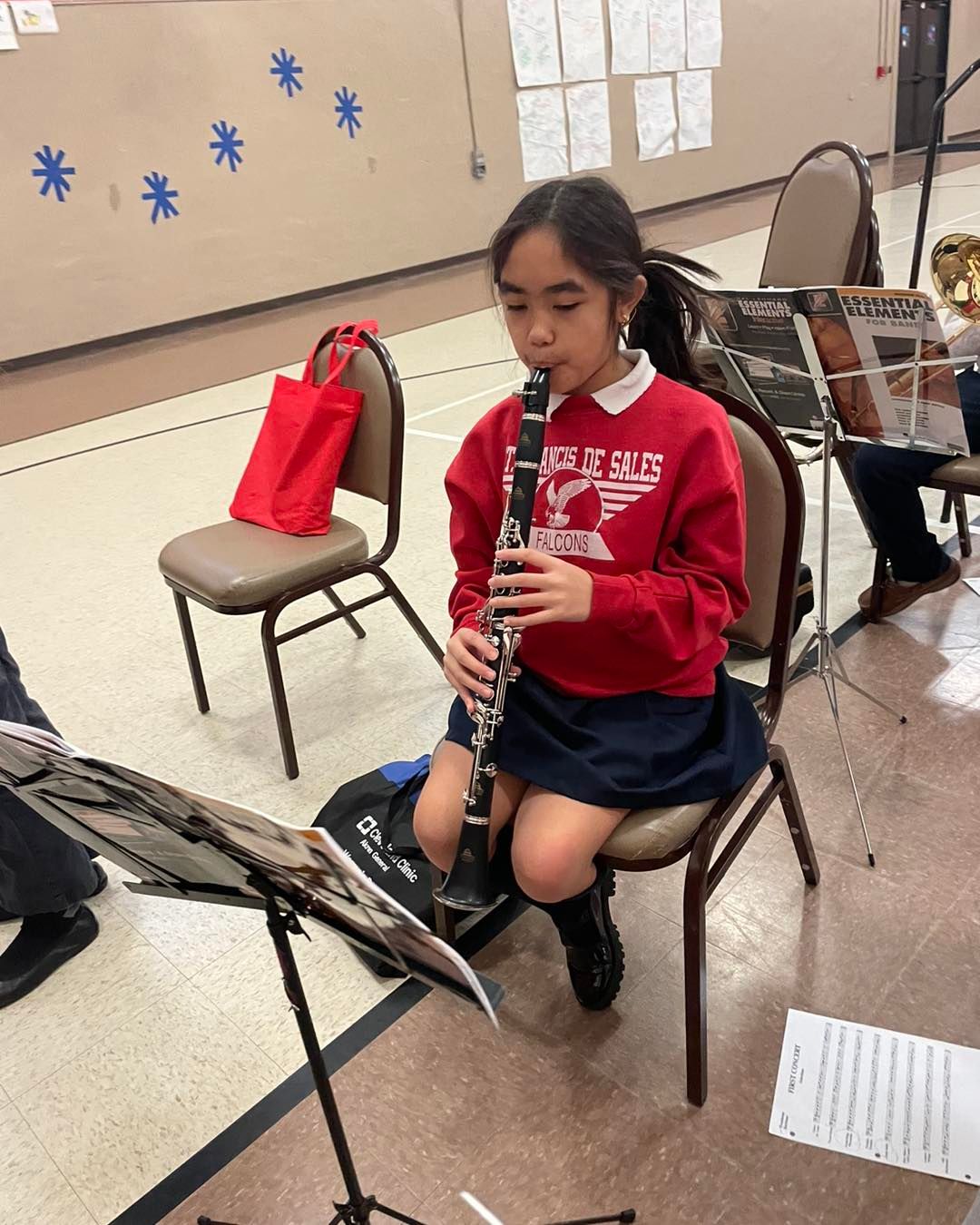 student playing clarinet