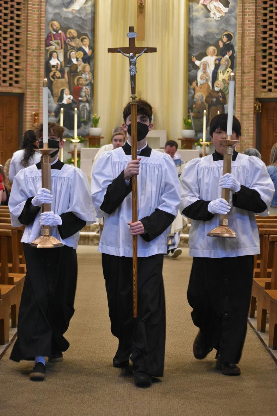 student participating in mass
